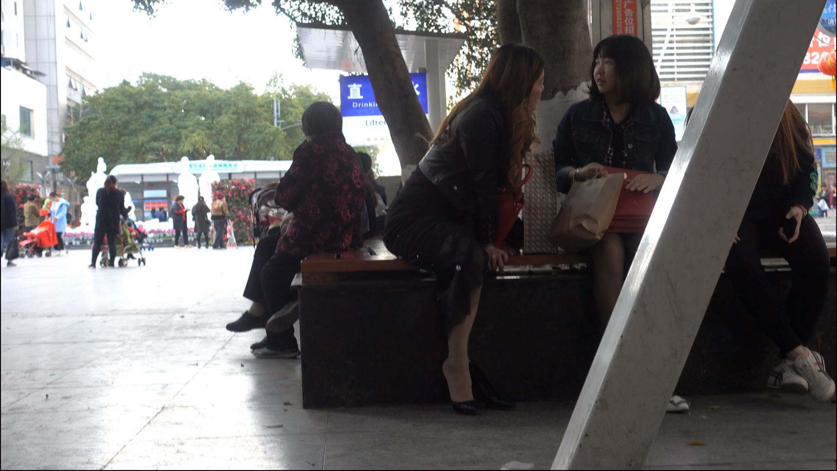 Beautiful girl with her friend and play shoes